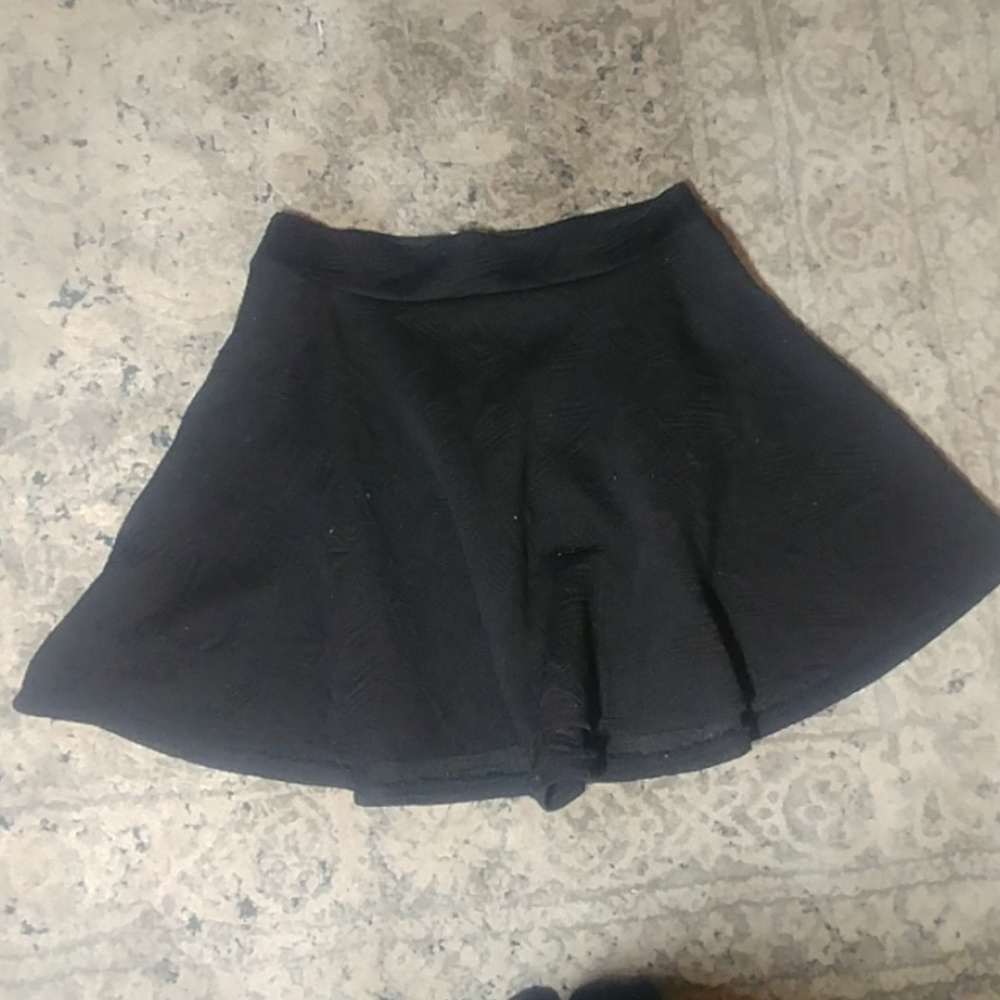 Fashion Magazine black mini skirt
